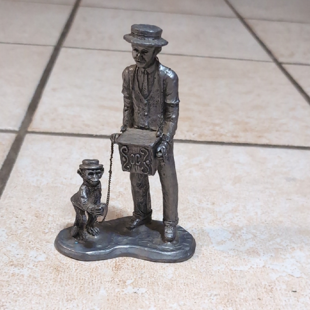 The Michael Ricker Pewter Organ Grinder.